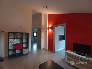 Attico mansardato arredato con ampio terrazzo