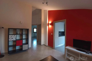 Attico mansardato arredato con ampio terrazzo