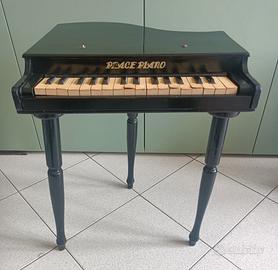 Pianoforte giocattolo antico 
