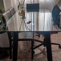 tavolo in vetro e pelle con 4 series in pelle