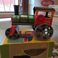 Giocattolo schiacciasassi in latta