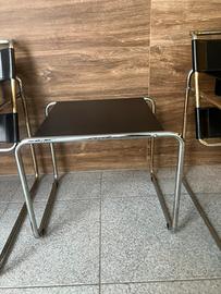 Poltrone e tavolo di design