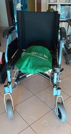 Sedia a rotelle pieghevole "E-Light" - c usata poc