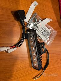 Luce per piatta moto