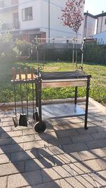 barbecue in ferro battuto e acciaio