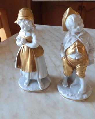 Coppia di statuine Capodimonte Bruno Merli dorate