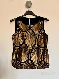 Top Sisley con paillettes oro
