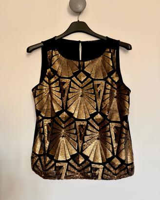 Top Sisley con paillettes oro