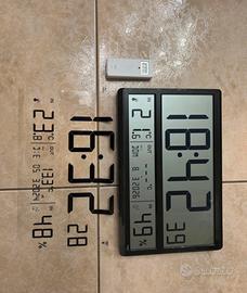 Orologio radiocontrollato TFA con stazione meteo