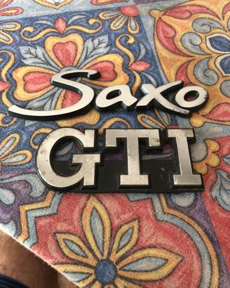 Logo posteriore saxo e logo mascherina golf 1990