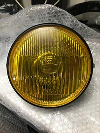 Faro anteriore universale vintage giallo