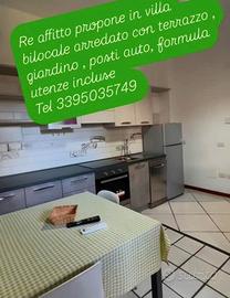 Loft bene arredato con giardino e posto auto