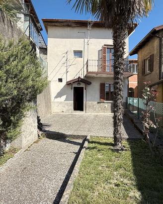 Casa con giardino
