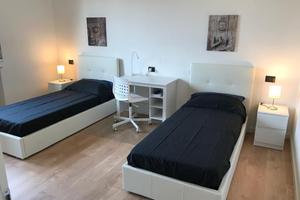 Letto in stanza doppia Borgo Roma