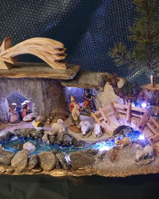 Presepe fatto a mano, su pietra naturale.