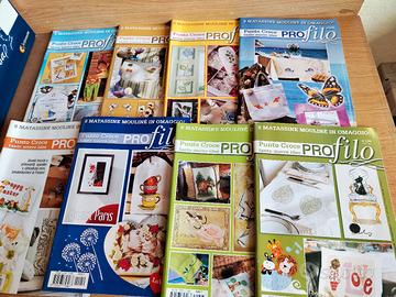 set 8 fascicoli profilo punto croce 