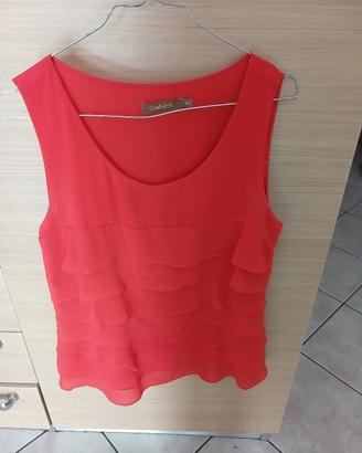 canotta elegante con balze