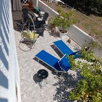 Appartamento con veranda coperta e cortile interni