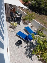 Appartamento con veranda coperta e cortile interni