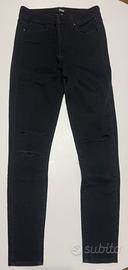 Jeans nero strappato paige