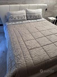 Letto in ecopelle con contenitore