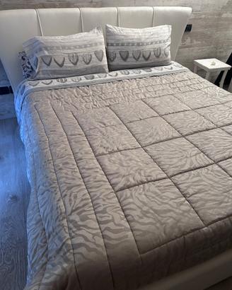 Letto in ecopelle con contenitore