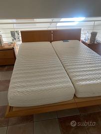 letto matrimoniale con comodini e como’