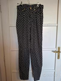 Pantalone Versace nero a pois bianchi
