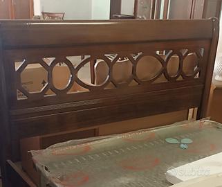 letto intagliato in legno con rete ortopedica 