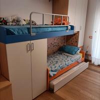 camera soppalco con scala contenitore e 3° letto