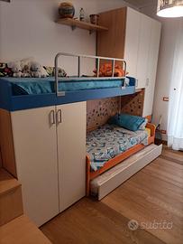 camera soppalco con scala contenitore e 3° letto