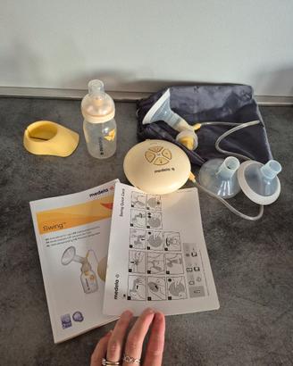 tiralatte medela swing 