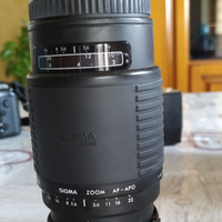 Teleobiettivo/ macchina fotografica analogica