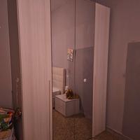 Armadio 4 ante + Letto contenitore 