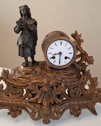 orologio da tavolo antico con statua