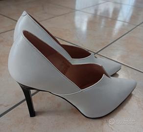 DÉCOLLETÉ IN PELLE