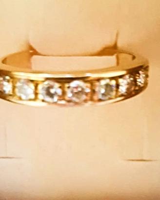 anello rivière con 7 brillanti oro giallo 18 kt