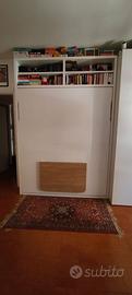 Letto matrimoniale a scomparsa.