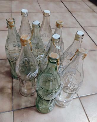 Bottiglie Coca-Cola anni '60