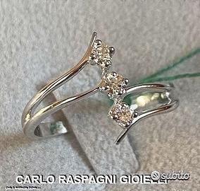 ANELLO TRILOGY ORO 18kt. CON DIAMANTI NATURALI