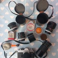 Reflex Canon FTb QL con vari obiettivi e filtri