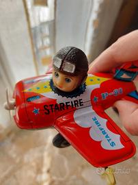 Aeroplano in latta vintage starfire a chiave