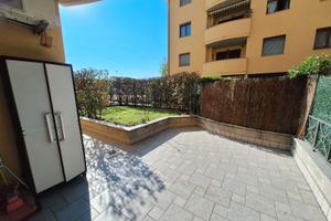 Bilocale con giardino e box