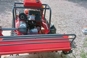 trattorino cingolato lawnmower