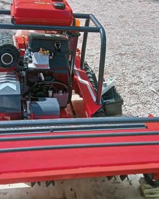 trattorino cingolato lawnmower
