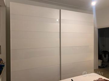 Atmadio  con ante scorrevoli Caccaro .