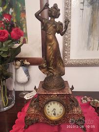 Orologio in marmo e metallo