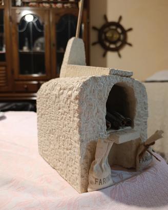 Camino artigianale in pietra – lavorazione a mano