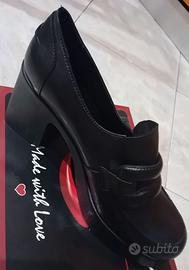 Mocassini con tacco vera pelle