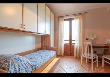 Armadio ponte con 2 letti